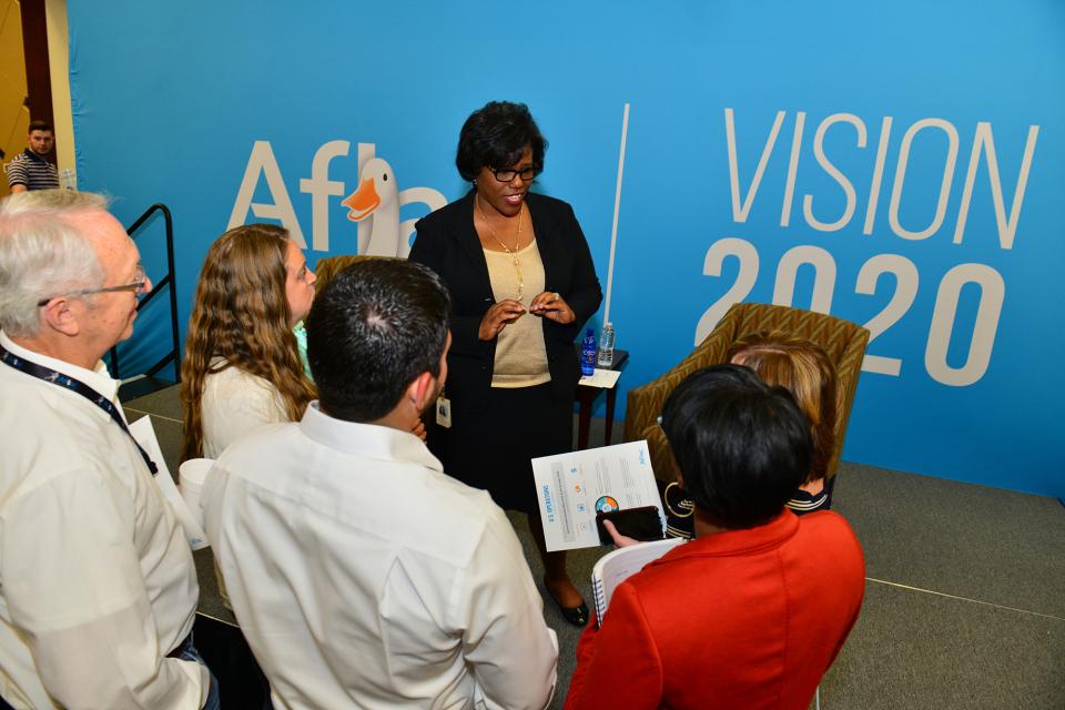 Aflac U.S. President Teresa White explains the details of Aflac’s corporate strategy during a town hall meeting.