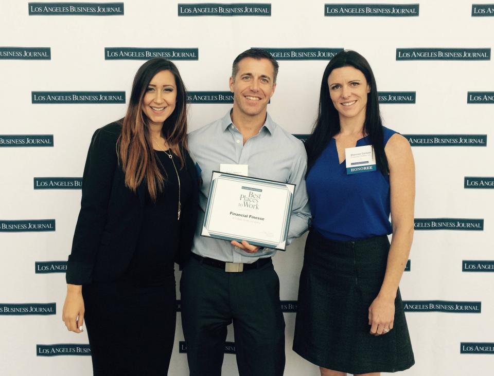 Financial Finesse team members accept the #2 position for Best Places to Work in LA award, 2015.