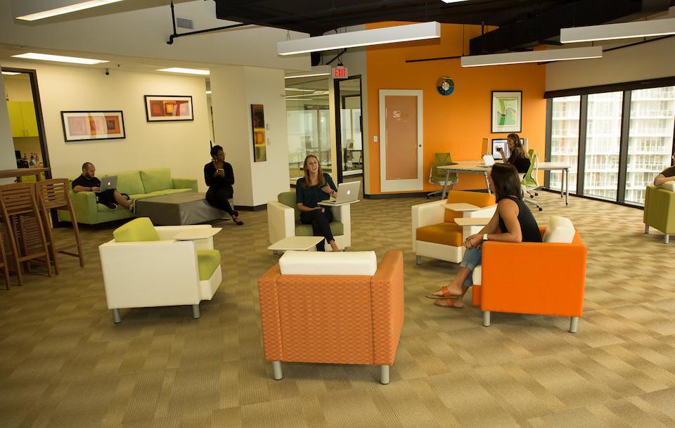 Squaremouth’s offices are completely open, with couches and lounge chairs, and no cubicles.