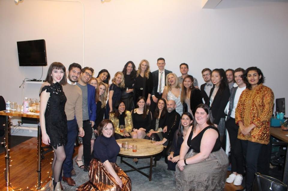 Members of our fifth floor teams--customer success, sales, and marketing-- before our annual holiday party