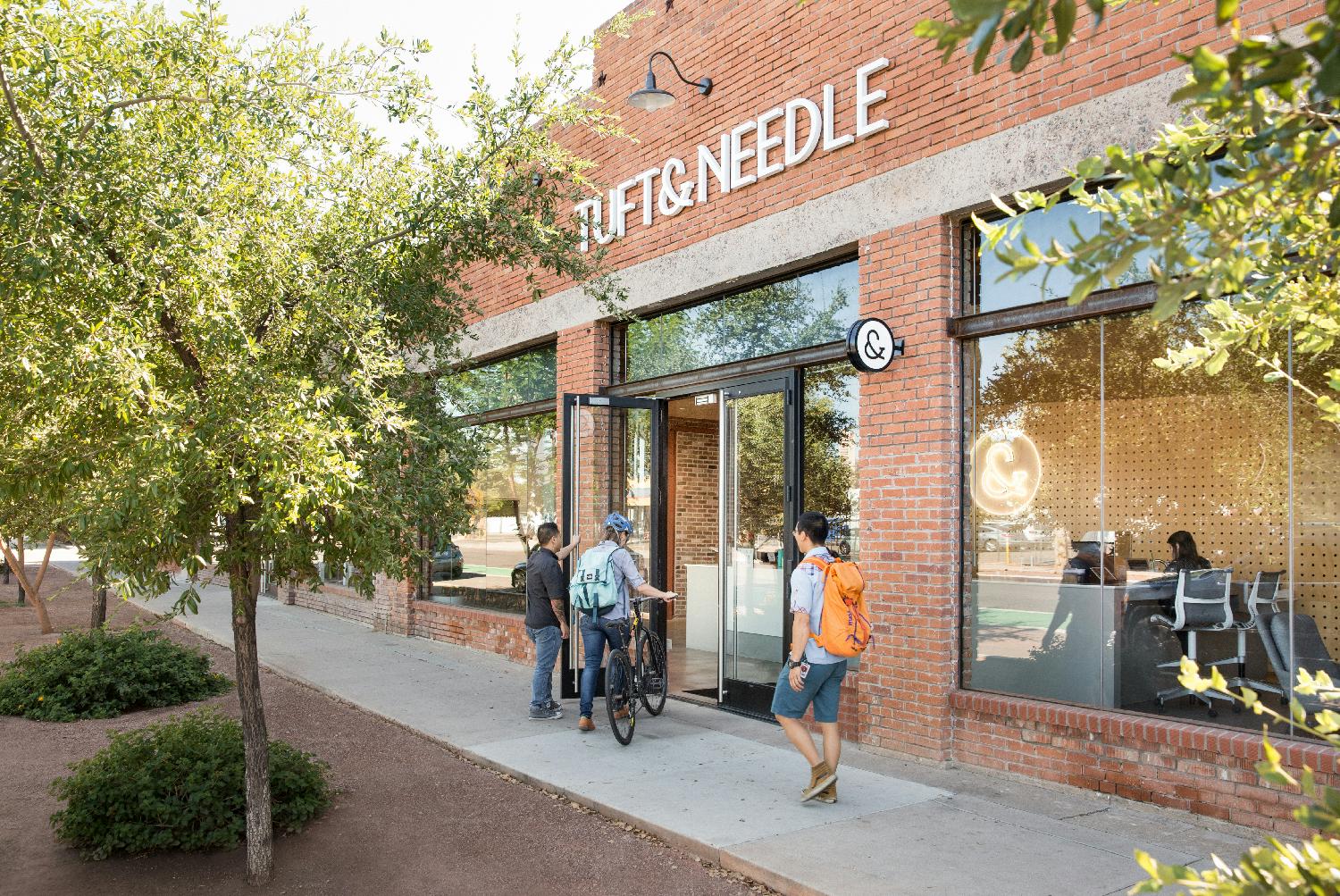 Employees collaborate at Tuft & Needle HQ.