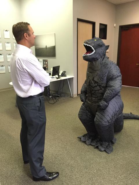 Team member speaking to the CEO on Halloween