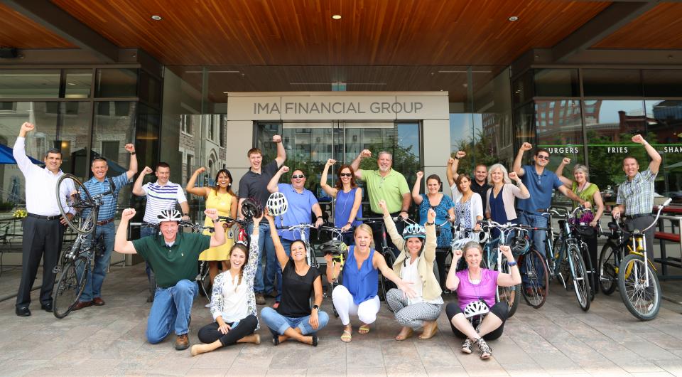 Members of the IMA family show their support for Bike to Work Day.