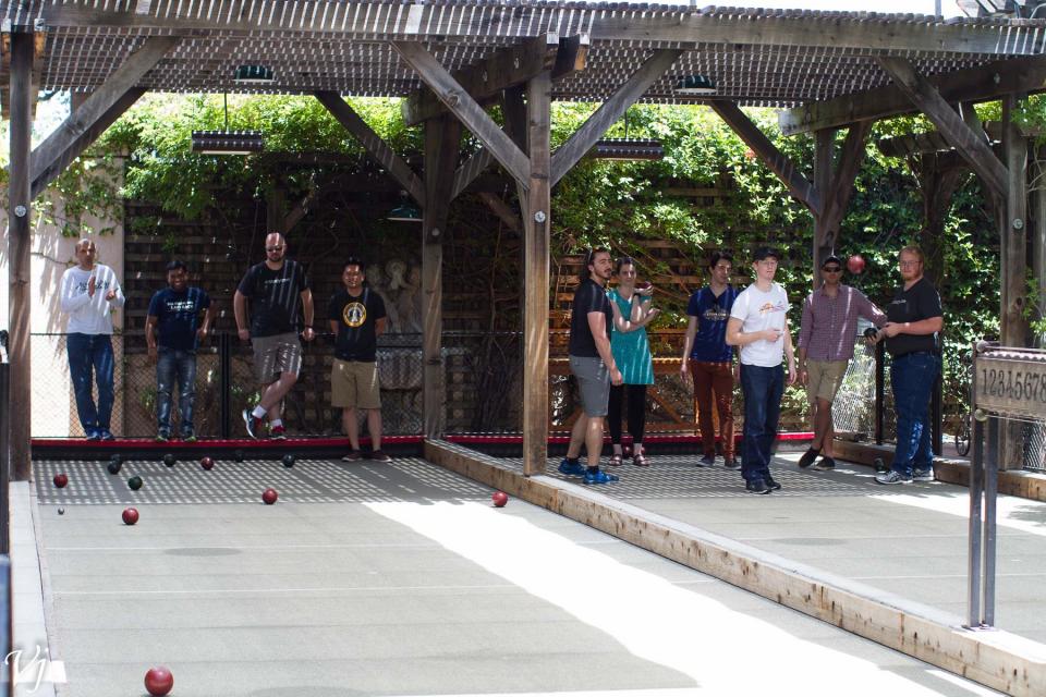 Study.com employees enjoy an afternoon of bocce ball.