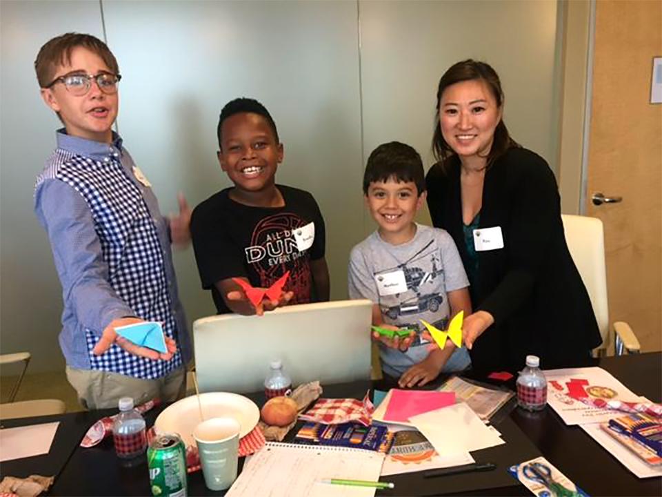 During Hunton's Los Angeles office’s Bring Your Child to Work Day, a staff member shared the ancient Japanese art of origami (paper folding) with three excited students!