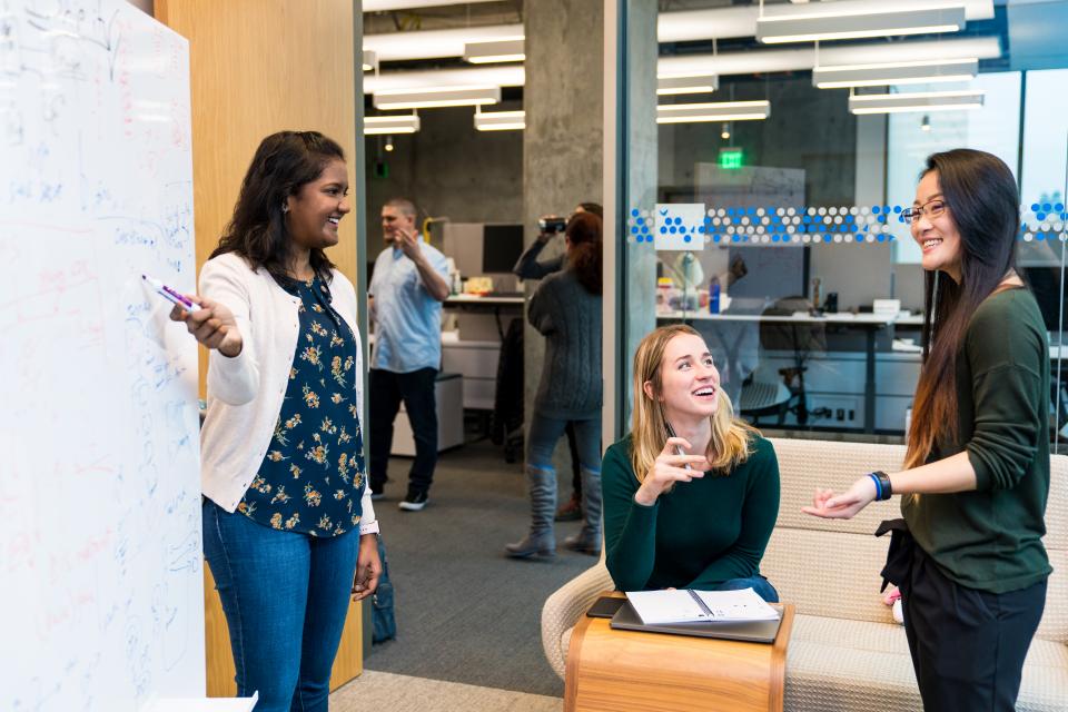 Intuit employees collaborating on campus