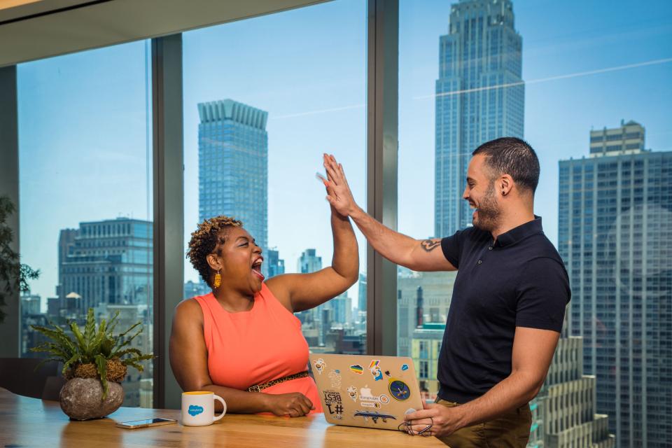 An employee working at Salesforce Tower San Francisco