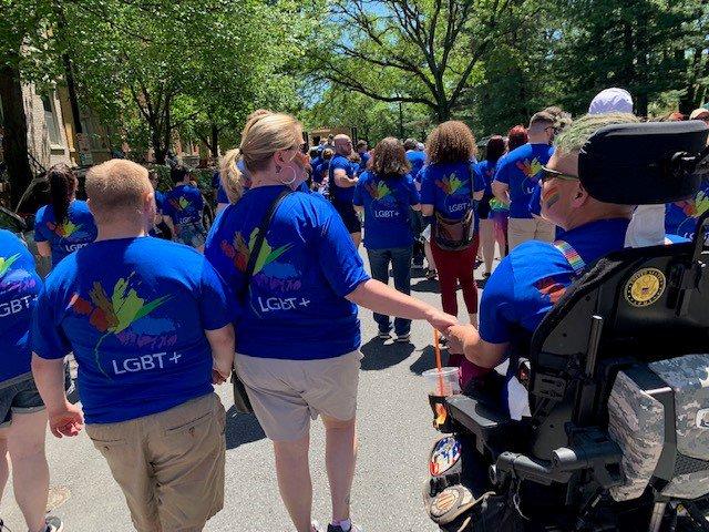 Employees celebrating at a local Pride event in 2019