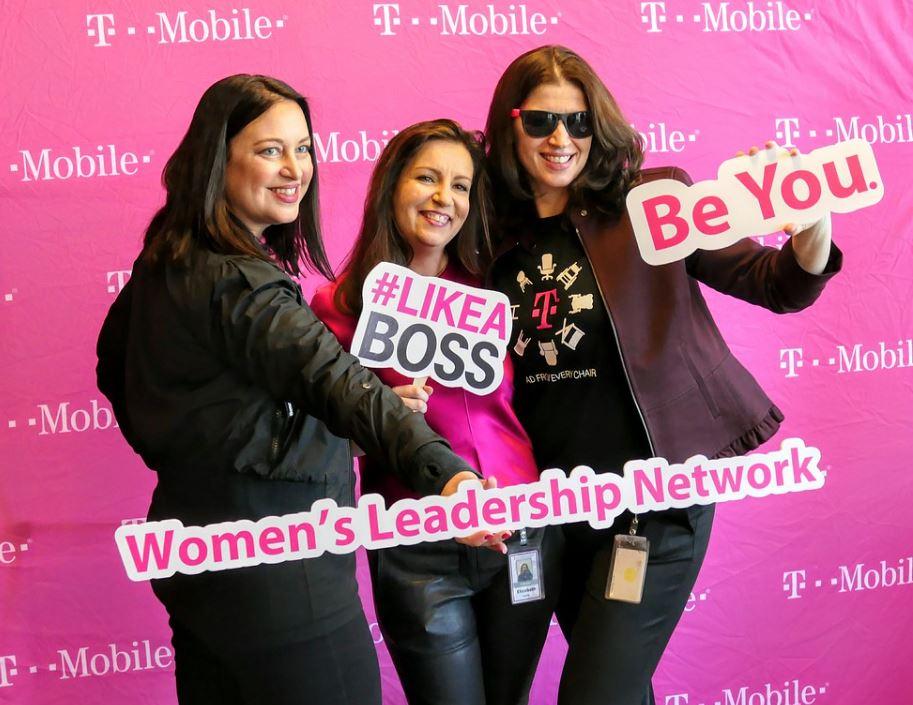 T-Mobile CEO Mike Sievert greets Team Magenta members as he enters a Town Hall meeting with employees in New York.  