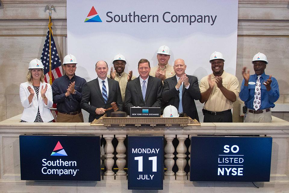 Employees from across Southern Company joined CEO Tom Fanning (center) to help ring the closing bell at the New York Stock Exchange July 11, 2016. 