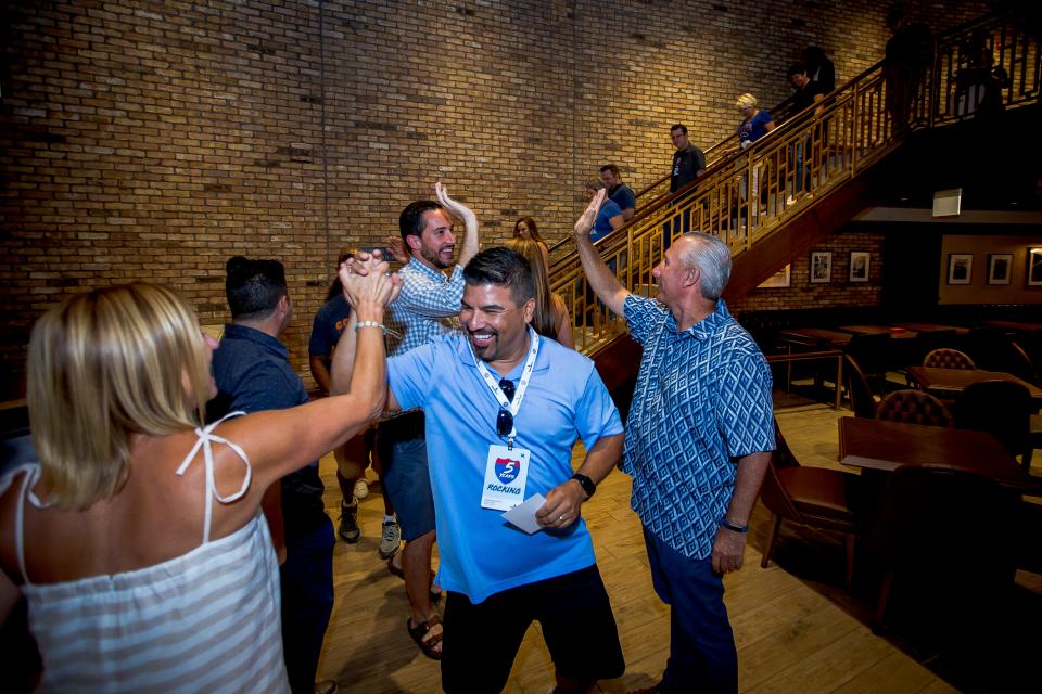 Colleagues pose for a photo during an Employee Appreciation Day event.