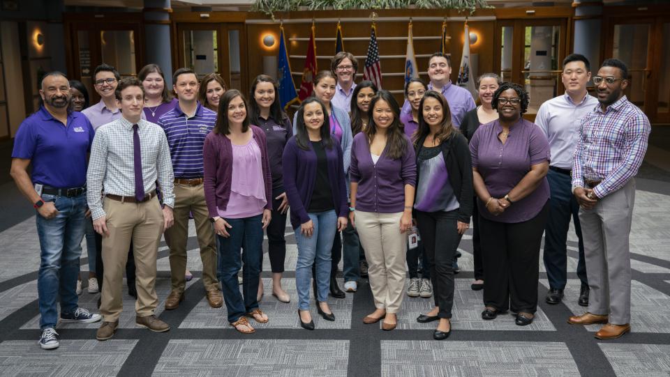 A team in Vienna, VA poses for a group photo pre-COVID-19.