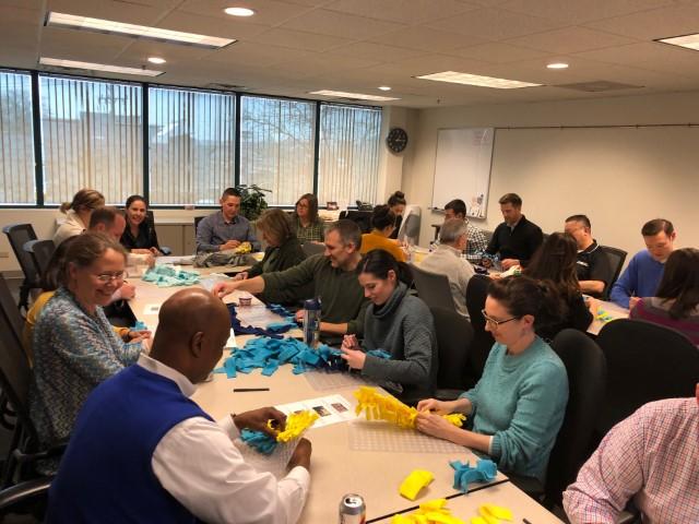 Boston employees volunteering at the Greater Boston Food Bank