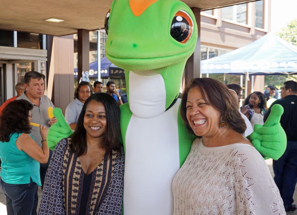 GEICO associates celebrate Founder Day with free ice cream and our constant buddy, the Gecko.
