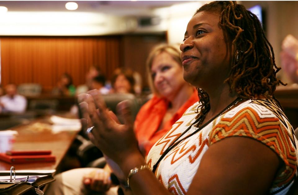 This meeting of the minds turns all smiles at a recent business presentation.