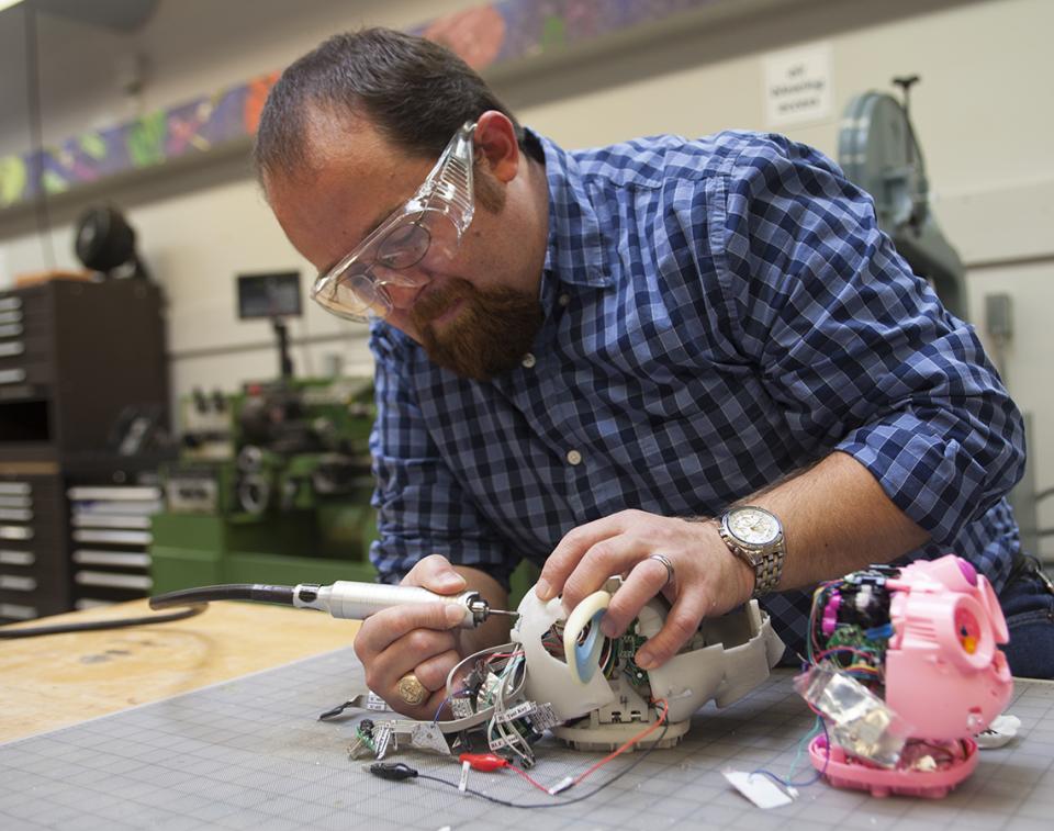 Animatronics engineer working on a prototype.