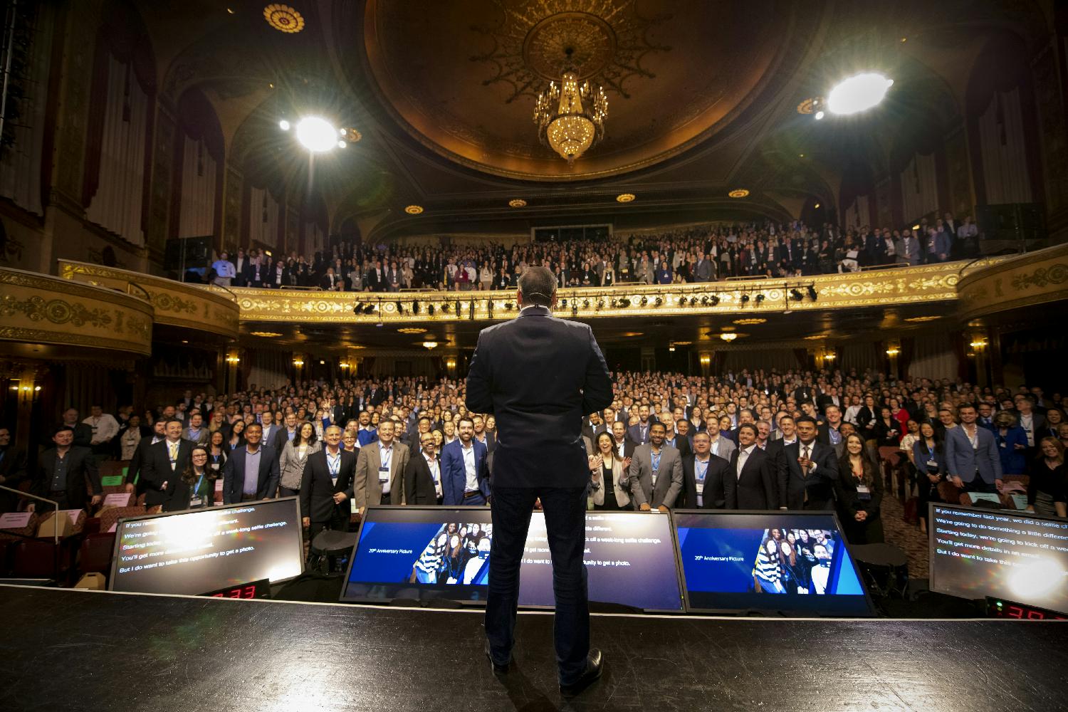 Cvent's CEO and Founder, Reggie Aggarwal, addresses employees at the Annual Companywide Meeting at Warner Theater in downtown Washington, DC.