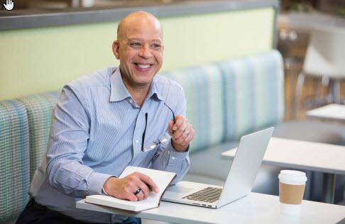 Associates collaborating at desks 