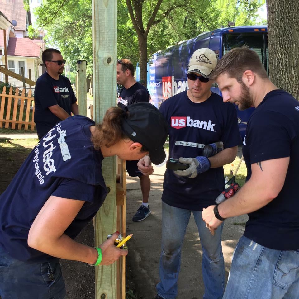 Volunteers from the Milwaukee chapter of our Proud to Serve Business Resource Group volunteer during the Community Possible Relay