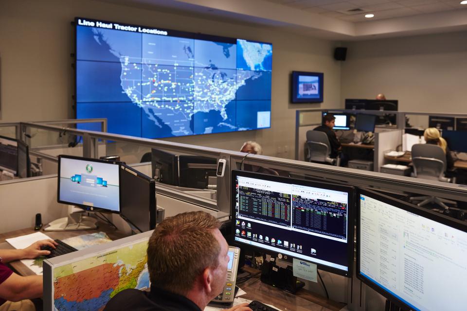 Dispatch employees monitoring freight across the country