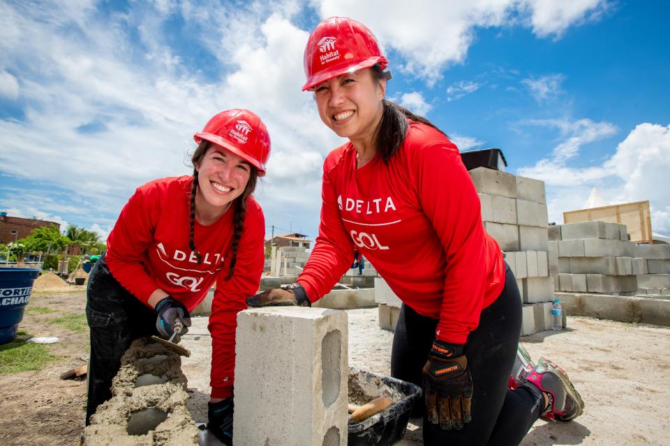 Delta employees participate in the company's Global Build in Brazil for Habitat for Humanity.