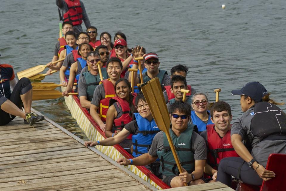 Employees participating in Dragonboat!