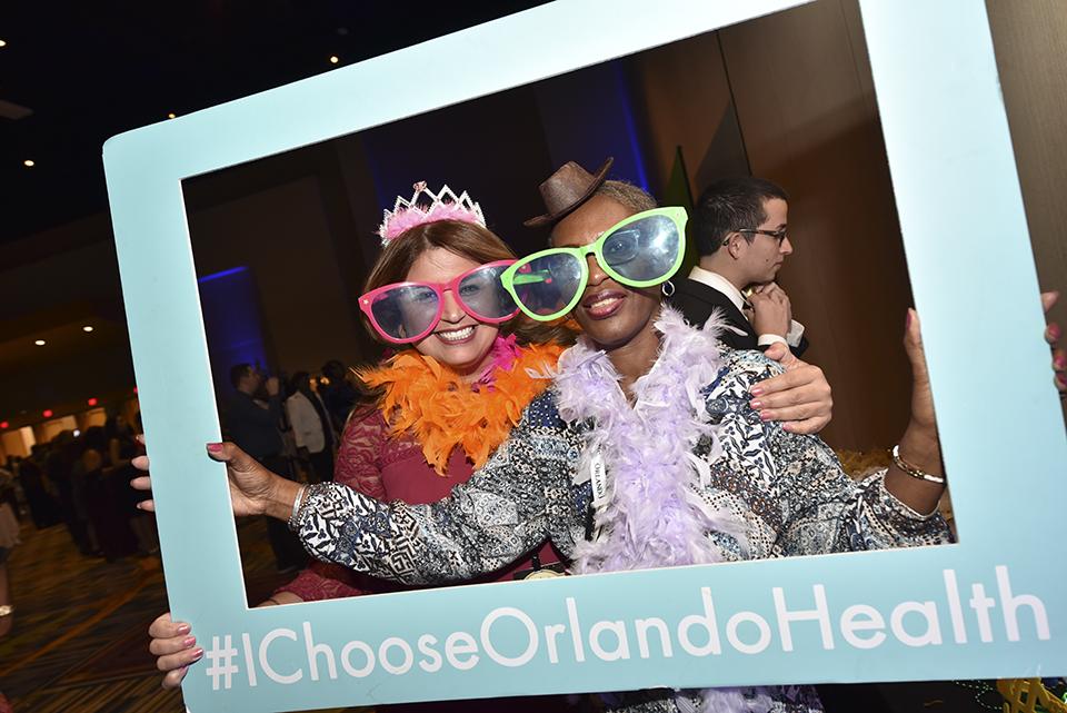 Orlando Health team members volunteer their time to fill 1,000 backpacks during a Great Backpack Build for schools.