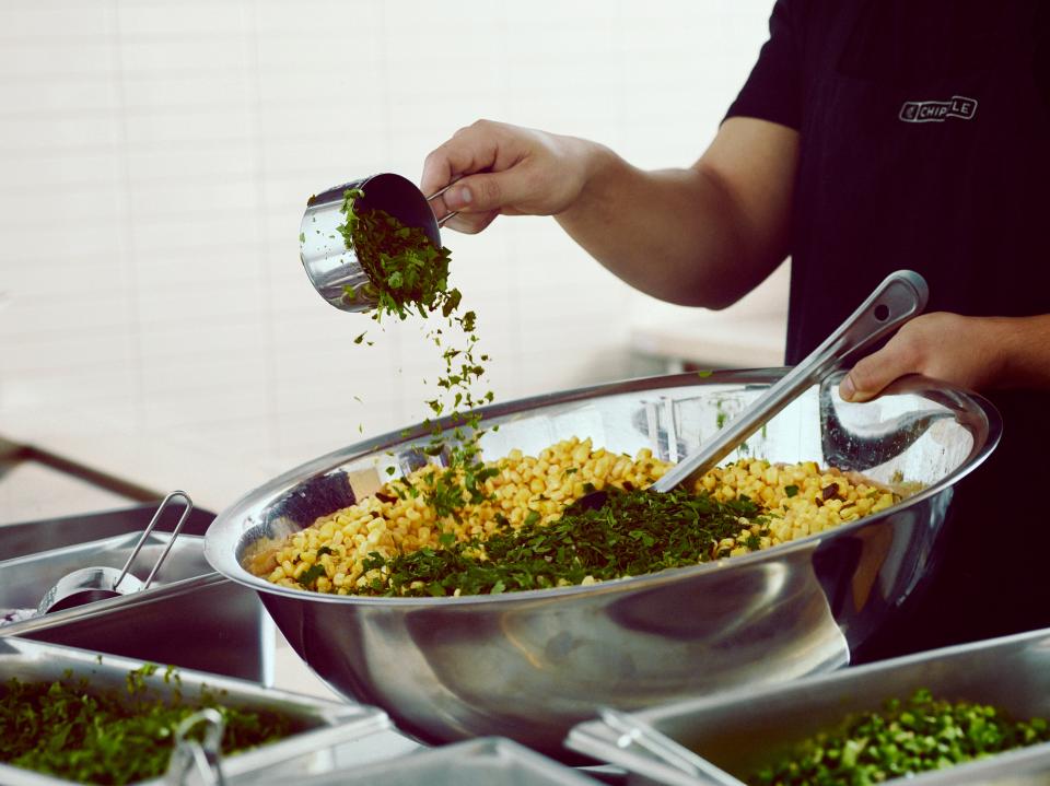 Making Chipotle corn salsa