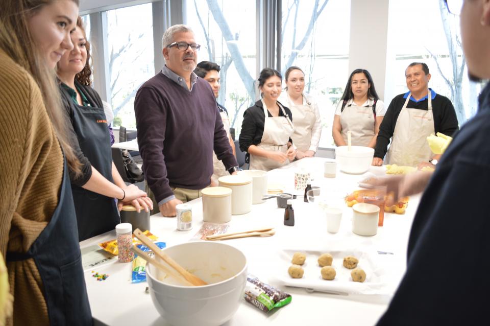 Prometheans discover the meaning behind our brand promise (I AM HOME) by baking cookies on their first day of orientation.