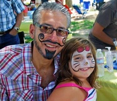 Our VP of Operations and his daughter at the annual Summer Barbecue!