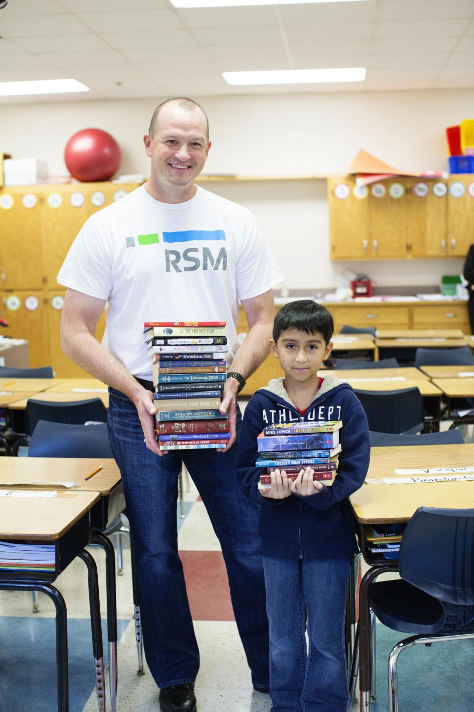 Getting the family involved in assembling school supplies during Volunteer Week