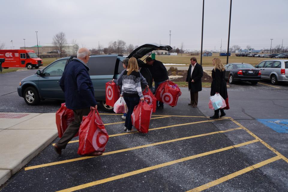 Delivering gifts for the Mayor's Toy Drive