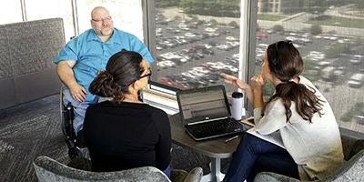 Employees taking advantage of our collaboration space