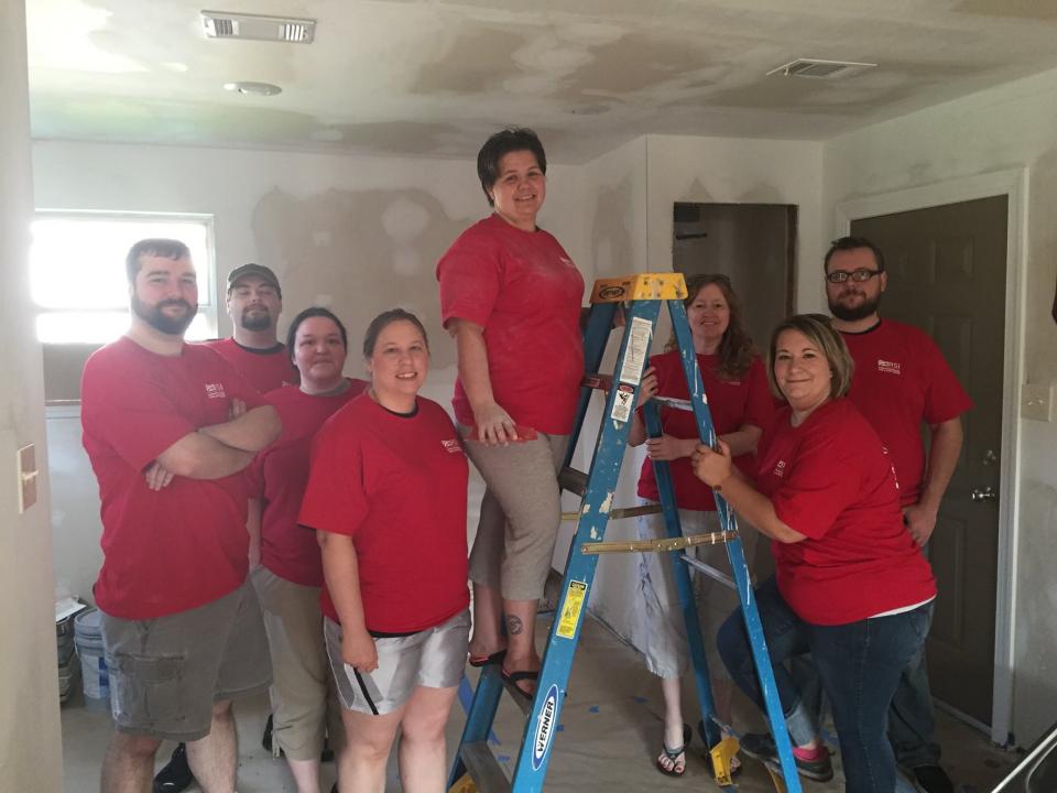 Some of our Jonesboro Colleagues as they lend a hand volunteering with Habitat for Humanity