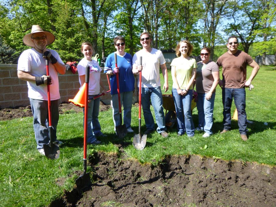 Employees donate their time at Sunrise Lake