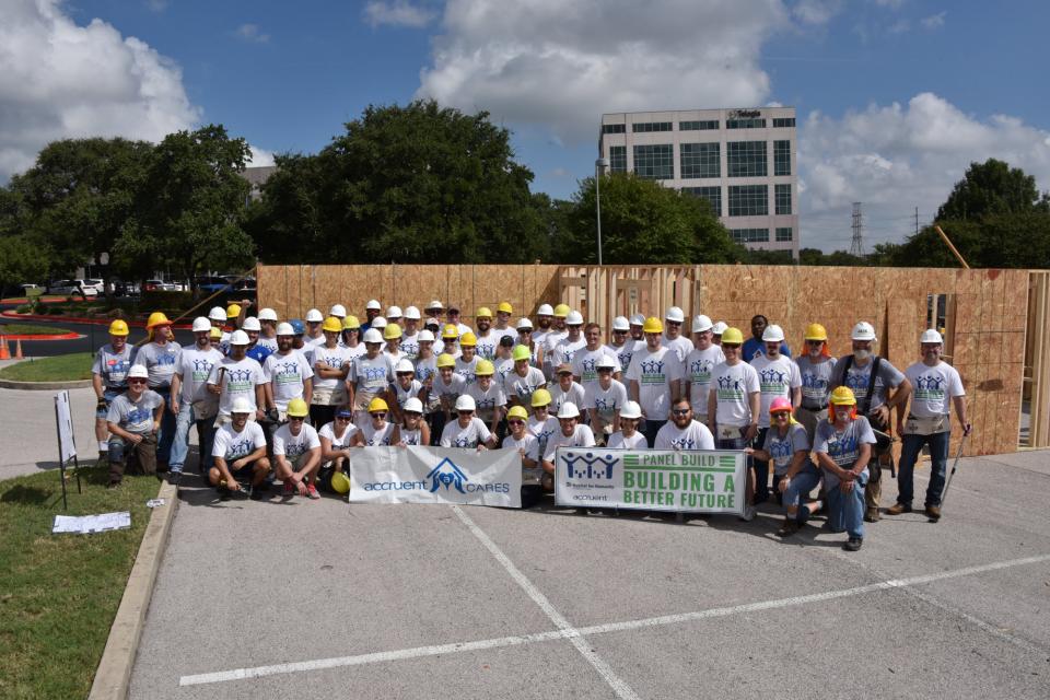 Accruent employees framed up a home with Habitat for Humanity to be transported to Kyle, TX for a needy family