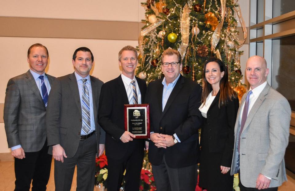 Our Team Celebrating a Record-Setting Year for an Annual Food Drive Benefitting a Local Food Bank