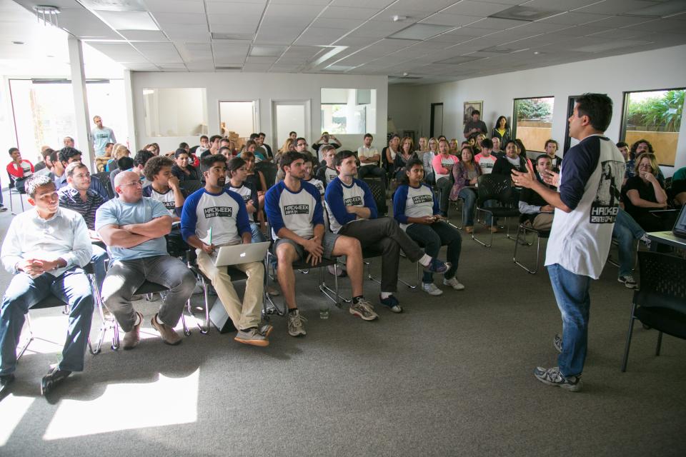 Employees present their hackweek projects to the office and the judges panel, made up of the members of the Executive team!