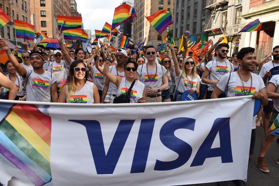 Visa employees marching in the 2018 New York Pride parade -- at Visa we believe in love, accepted everywhere