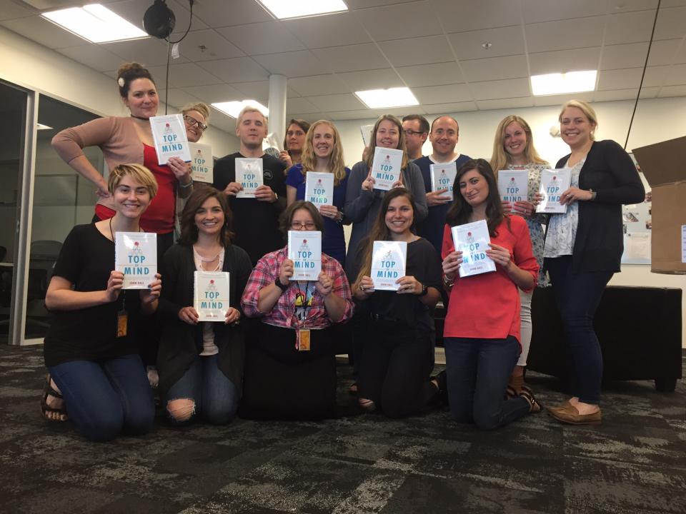 Our team posing with their personalized copies of \