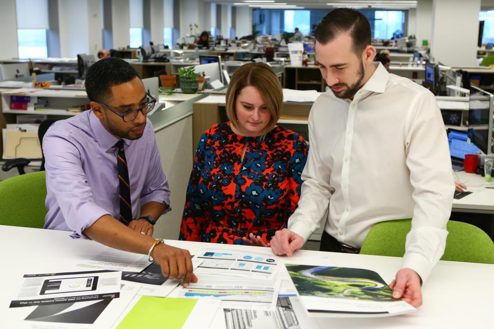 Employees in our New York office collaborate on a project.