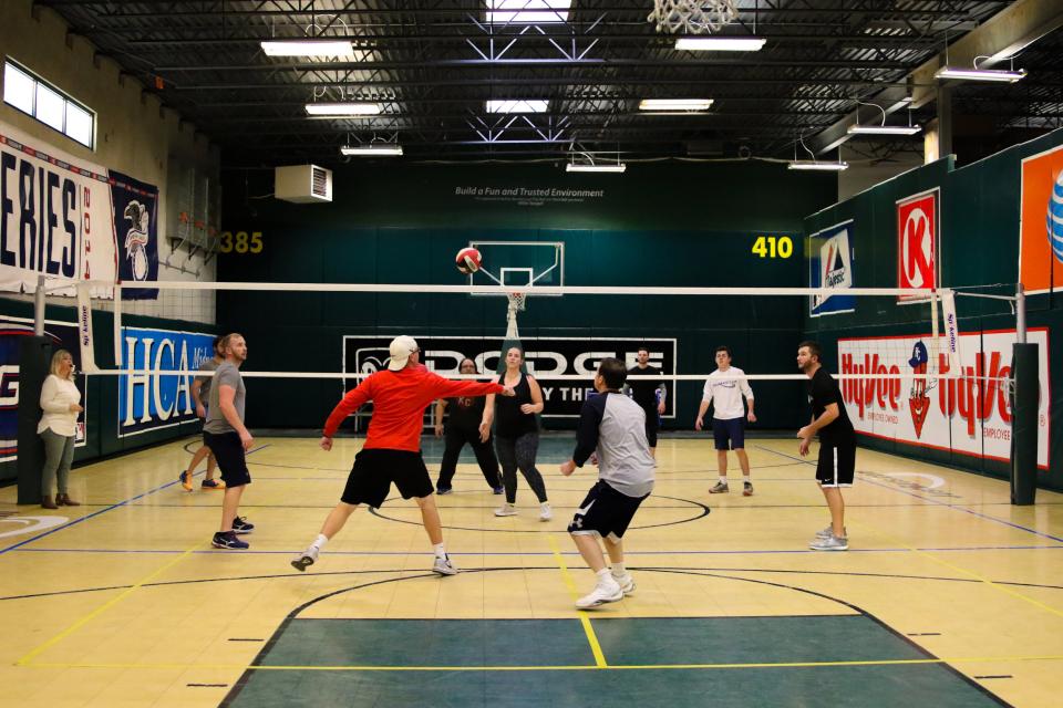 This is a typical Tuesday afternoon 3:45 PM company pick-up volleyball game.