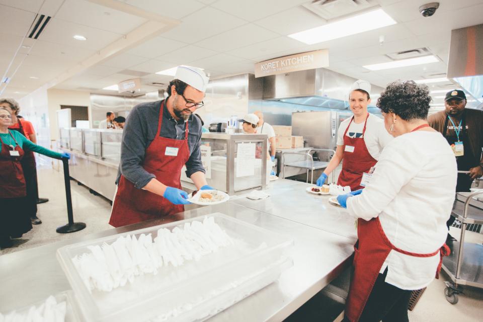 Zendesk CEO Mikkel Svane working the lunch shift at neighboring non-profit, St. Anthony's.