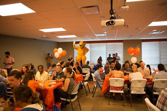 Employees mingling with local IT Pros on SysAdmin Day