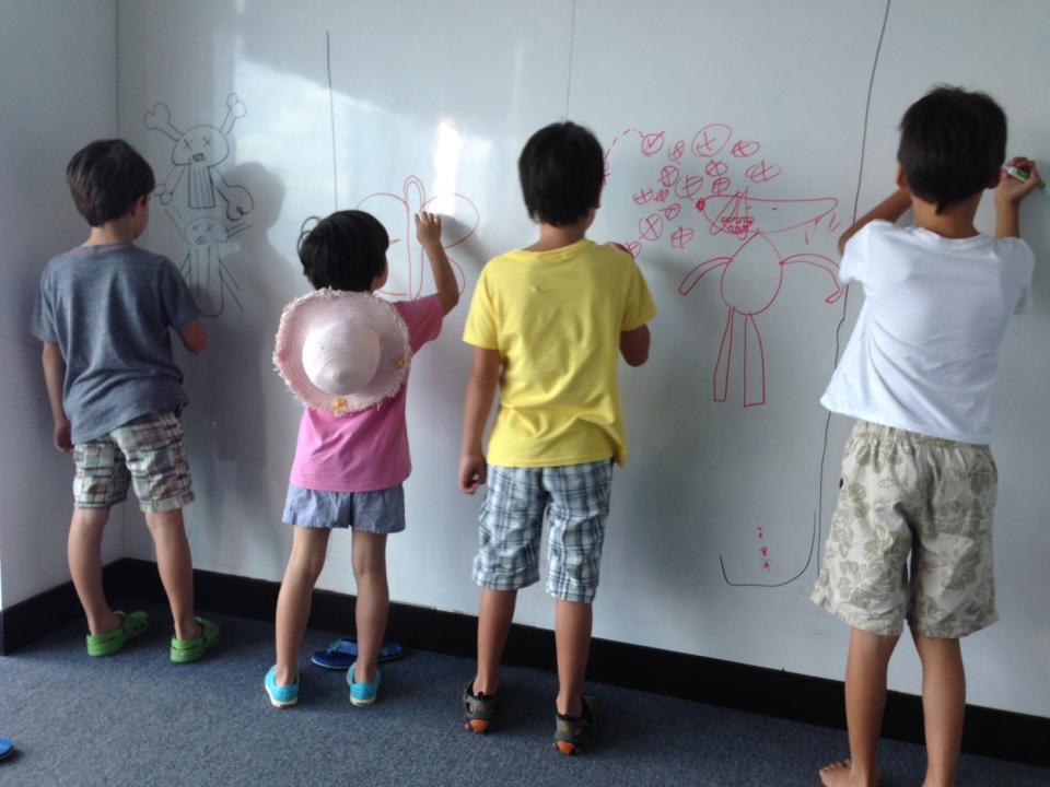 Kids at the office! Just sketching out some business processes.