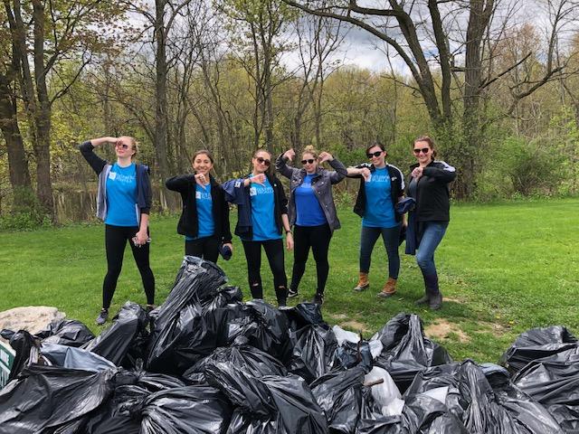 Team GS Buffalo participating in a waterway cleanup hosted by Buffalo Niagara Waterkeeper