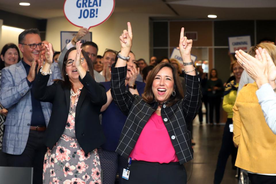 President Christine Duffy celebrates during a quarterly town hall.