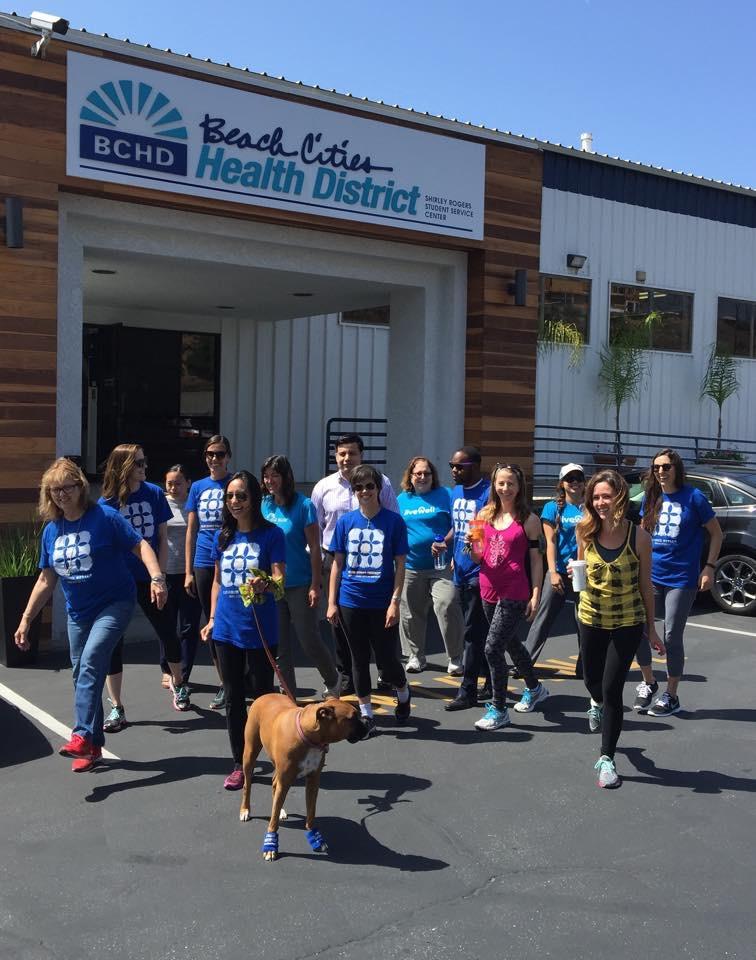 Employees take a walk around the campus