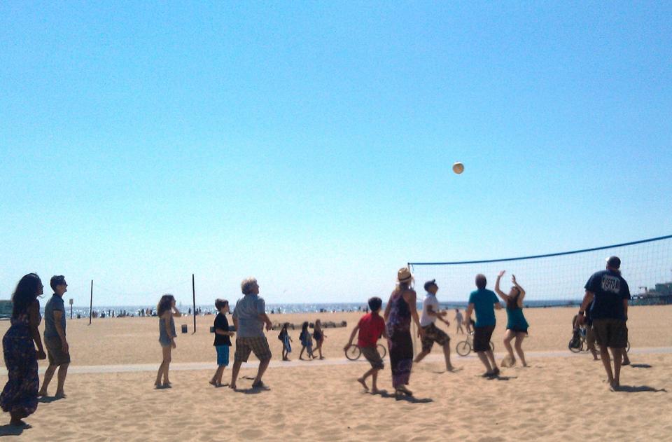 Playing volleyball at the Summer Party