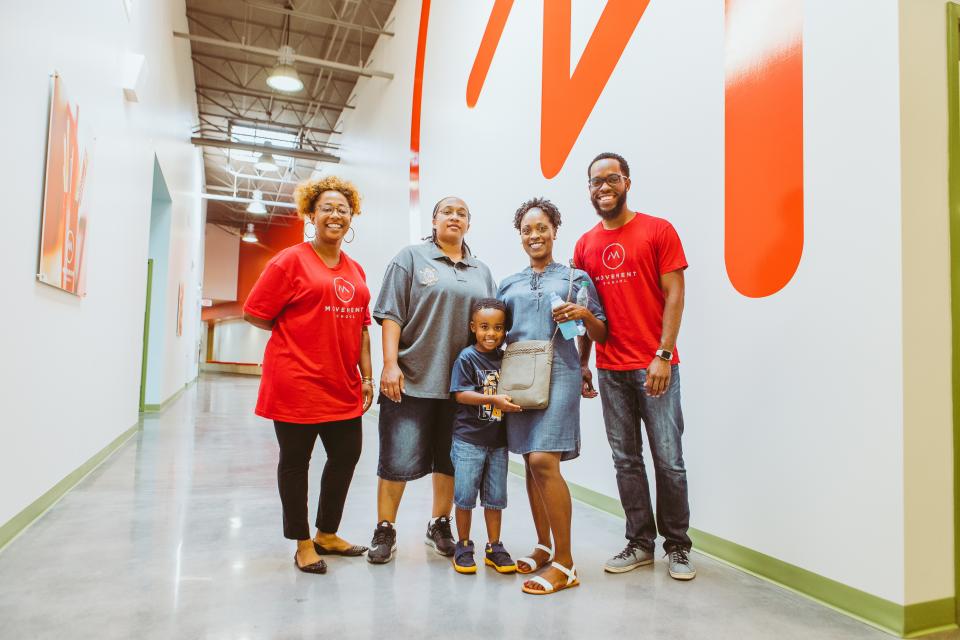 Teachers and students celebrate the opening of Movement School, a public charter school founded by Movement Foundation.